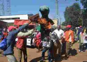 Police Rescue Martha Karua from Angry Waiguru Supporters