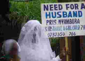 Placard-Carrying Nairobi Woman in Search of Husband Re-Unites with Father after 22 Years