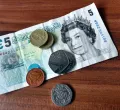 UK's New Prime Minister Faces Economic Challenges Amidst Social Care Debate