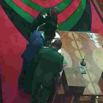 MP Francis Nyenze Shows Up in Parliament for Swearing-in With Oxygen Tank