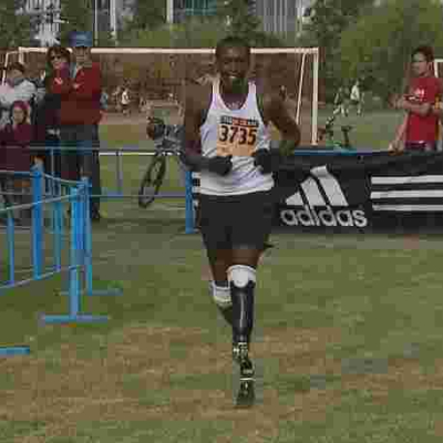 Kenyan-Born Runner who Lost His Legs to Frostbite in US Breaks Amputee Marathon Record in Boston