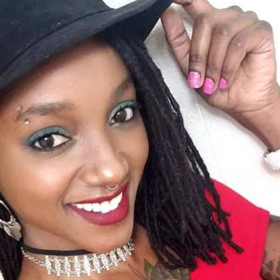 US-Based Kenyan Tattoo Enthusiast Wakenya "Kenyan Hippie" Clewis in Inked Magazine's Cover Girl Contest, Seeks Your Vote