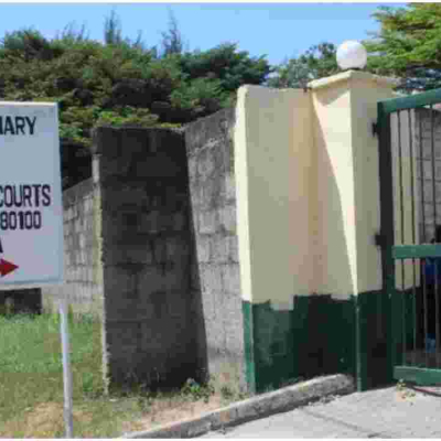 Woman Caught on CCTV Sprinkling White Powder Outside Magistrate's Office in Mombasa 