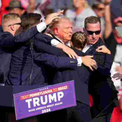 Bloodied Trump Evacuated as Gunfire Erupts at Pennsylvania Rally