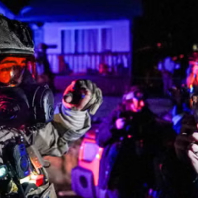 Trump Threatens to Invoke Insurrection Act to Deploy Troops to Minnesota After ICE Protests