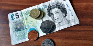 UK's New Prime Minister Faces Economic Challenges Amidst Social Care Debate